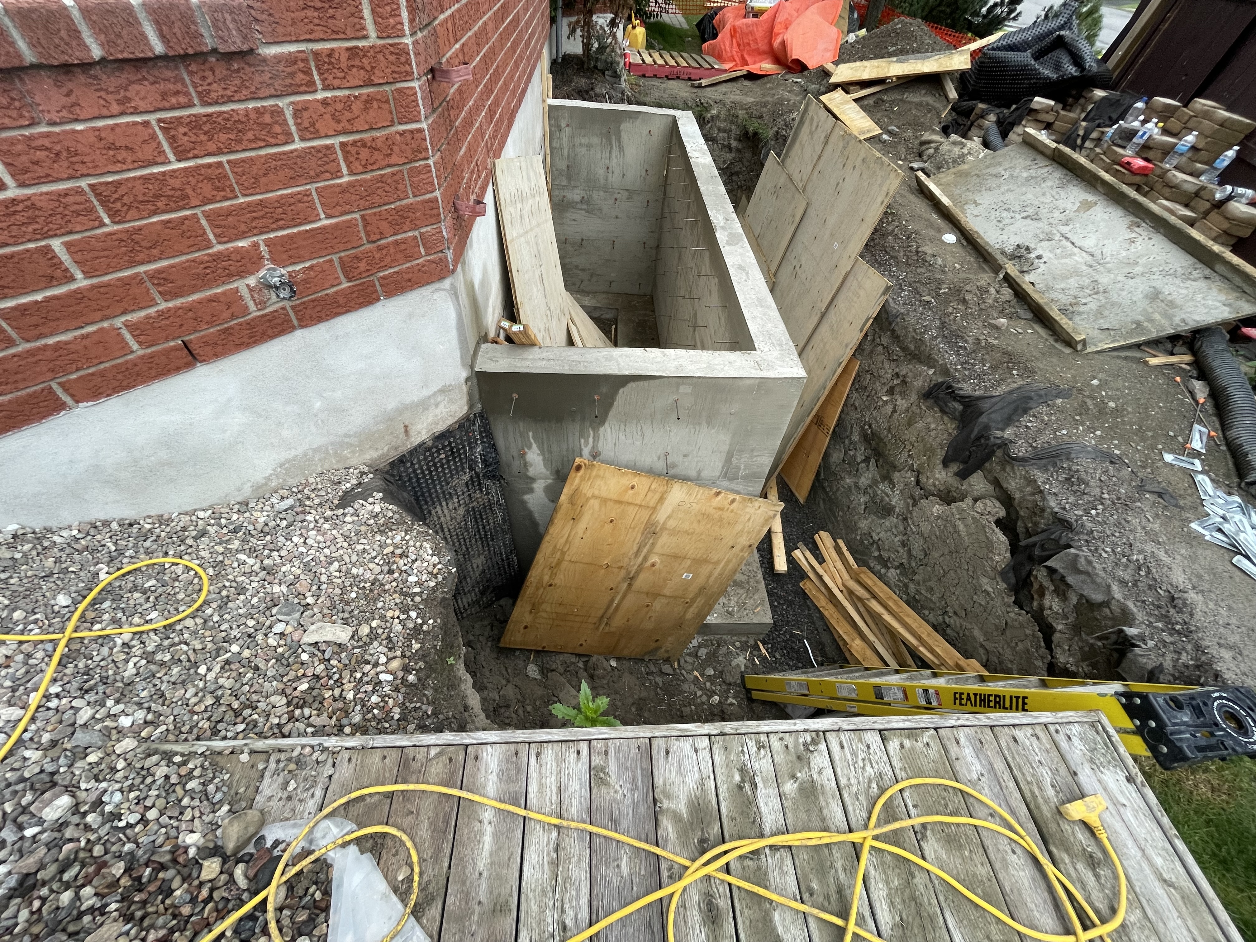 sunken basement entrance in custruction